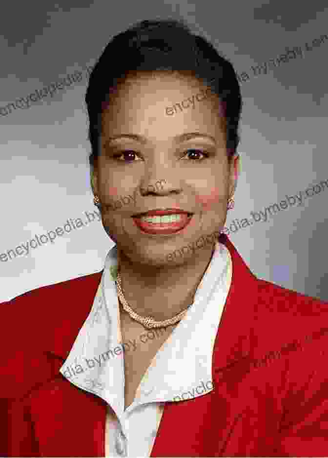 A Portrait Of Claudia Dobson Largie, Smiling And Looking Into The Camera. Country Jumper In Guyana Claudia Dobson Largie