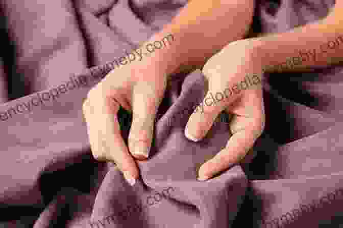 Image Of A Hand Touching A Fabric Sample, Showcasing Its Softness Effect Of Mechanical And Physical Properties On Fabric Hand (Woodhead Publishing In Textiles)