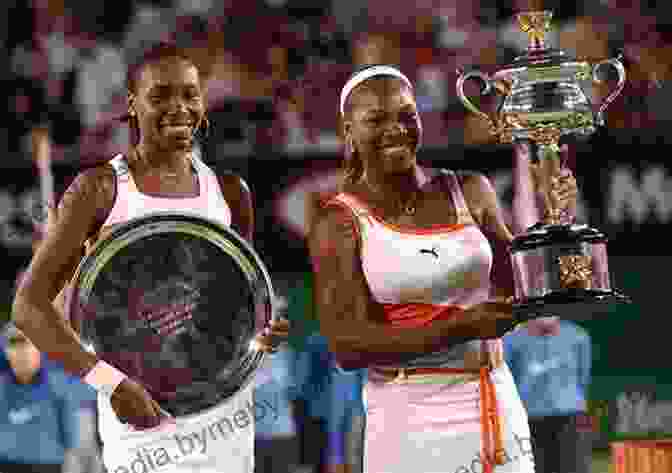 Venus And Serena Williams Pose For A Photo. Venus Is On The Left, Wearing A Blue Dress. Serena Is On The Right, Wearing A Pink Dress. Both Sisters Are Smiling And Holding Tennis Rackets. Venus And Serena Williams: Tennis Superstars (The Girl Who Would Grow Up To Be 3)